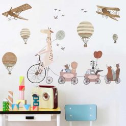 Alternative view of Stenske nalepka Žirafa na kolesu
